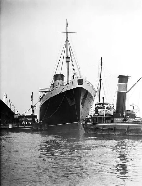 The RMS Mauretania brought up the Thames to King George V Dock at Woolwich