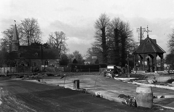 Road widening St. Giles church and pump, Ickenham 15th February 1935