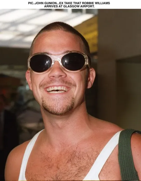 Framed Print : Robbie Williams arrives Glasgow Airport T In The Park festival August 1995