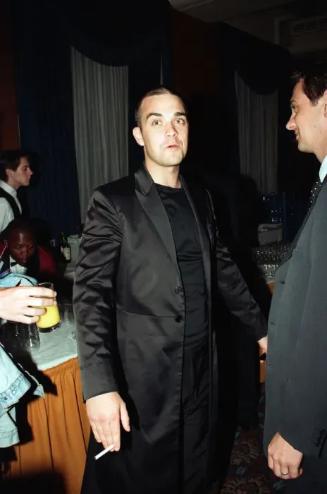 Framed Print : Robbie Williams attending the Elite Model Look of the Year competition, Connaught Rooms Framed Print : Robbie Williams attending the Elite Model Look of the Year competition, Connaught Rooms