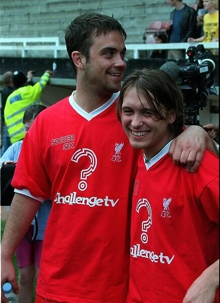 Robbie Williams with Mark Owen former members of pop group Take That at a charity