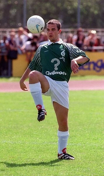 Robbie Williams Singer May 1998 playing football during the celebrity soccer match