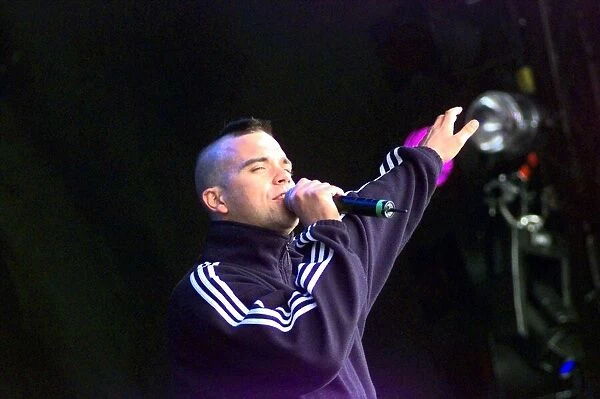 Robbie Williams singing at T in the Park July 1998 Kinross