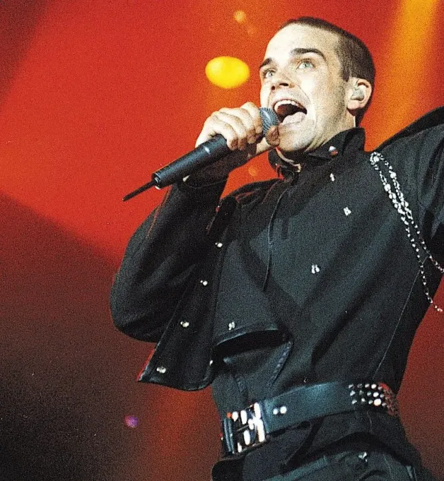 Framed Print : Robbie Williams Take That on stage singing microphone circa 1995 Framed Print : Robbie Williams Take That on stage singing microphone circa 1995