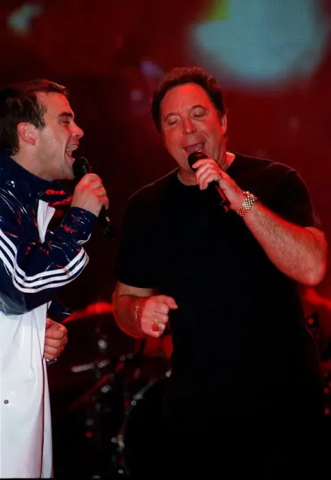 Framed Print : Robbie Williams and Tom Jones February 1998 Rehearsing their act on stage for