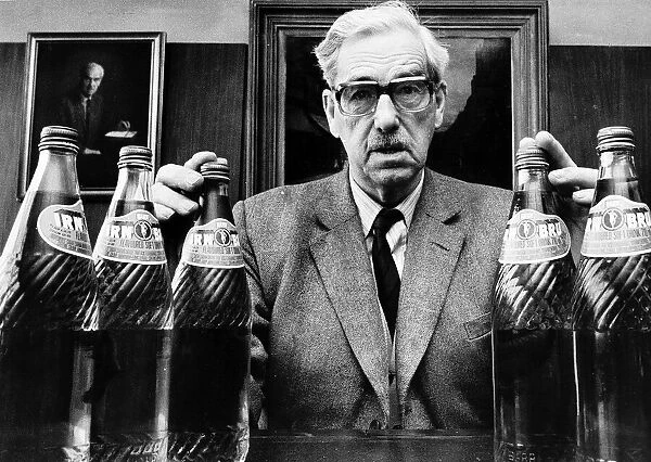 Robert Barr of Barrs Irn Bru with bottles circa 1970