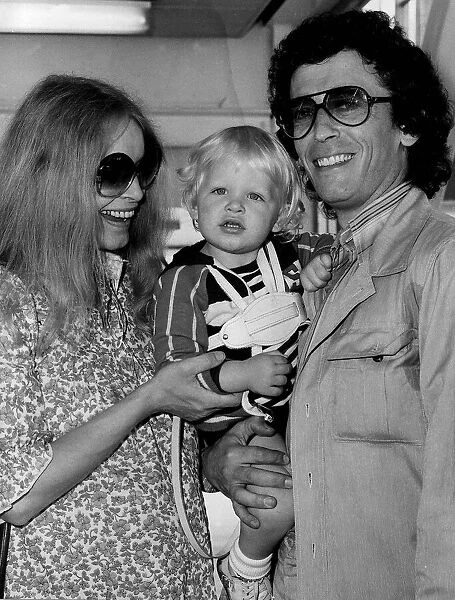 Robert Powell actor with his wife and 17month old Barnaby