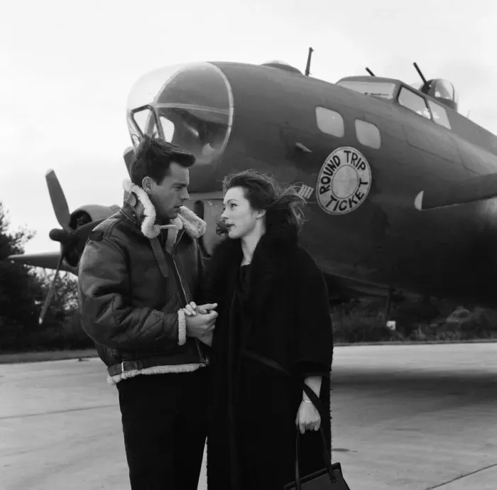 Framed Print : Robert Wagner and Shirley Anne Field filming the War Lover in front of a Boeing B17