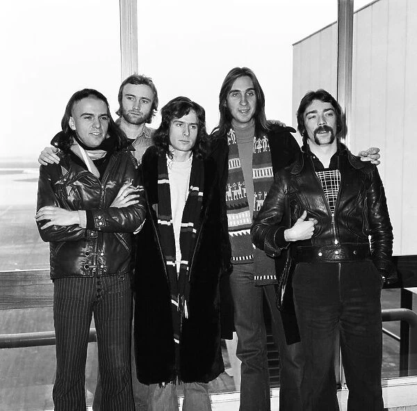 Rock group Genesis at Heathrow before flying to America for a three month tour