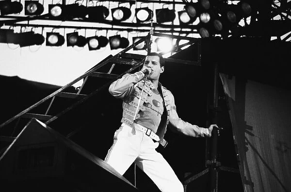 Rock group Queen in concert at Knebworth pop festival. Lead singer Freddie Mercury