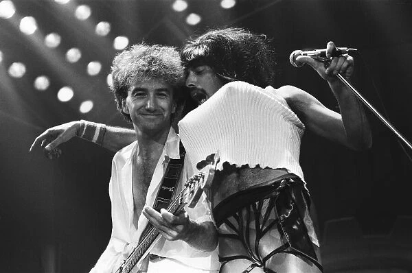 Rock group Queen in concert at Wembley Arena. Lead singer Freddie Mercury