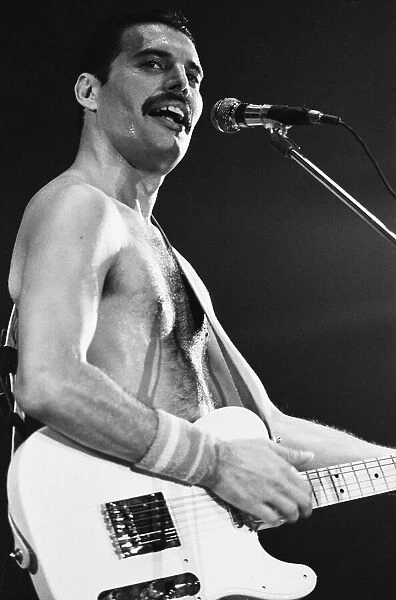 Rock group Queen in concert at Wembley Arena. Lead singer Freddie Mercury