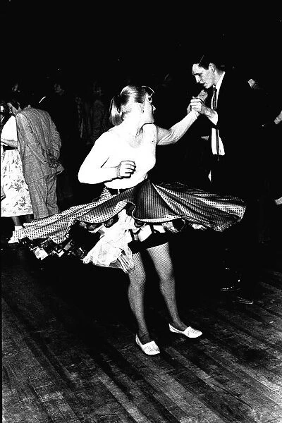 Rock and Roll dancers jiving on the dance floor at a Jerry Lee Lewis concert at