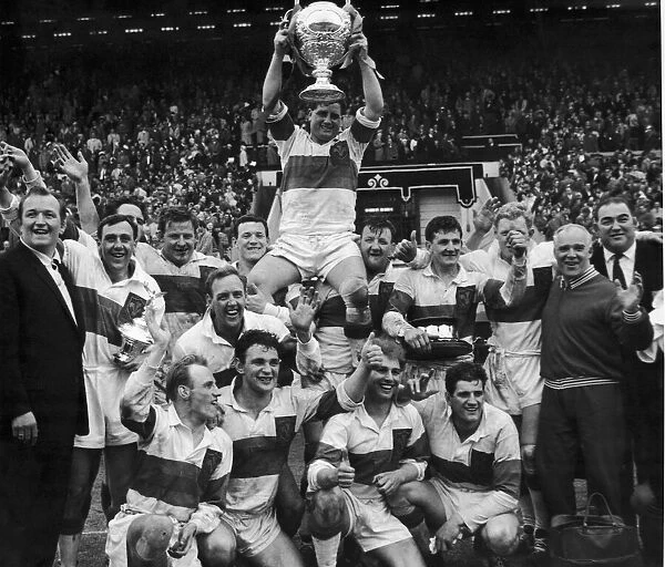 Rocky Turner the Wakefield Trinity captain is chaired with the trophy after his team won