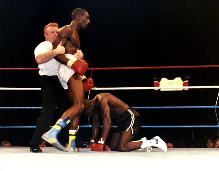 Framed Print : Rod Douglas is knocked down during a fight against Errol Graham at Wembley in 1989 Framed Print : Rod Douglas is knocked down during a fight against Errol Graham at Wembley in 1989
