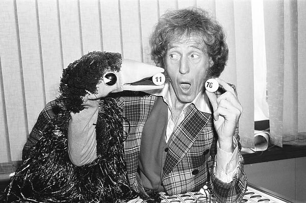 Rod Hull and his feathered friend Emu seen here picking numbers for the Daily Mirror