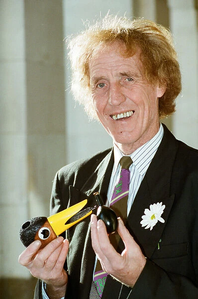 Rod Hull seen here with a miniature head of his feathered partner Emu. 12th January 1993