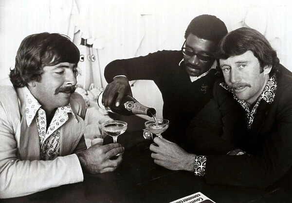Rod Marsh, Australian Cricketer having a glass of Champagne with Clive Lloyd