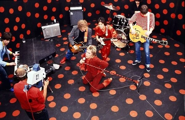 Rod Stewart and his band during rehearsals for his 1980 European tour. October 1980