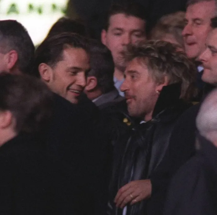 Framed Print : Rod Stewart pop star shares a joke with Dean Holdsworth Wimbledon footballer at a Celtic