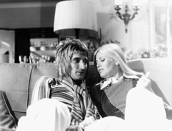 Rod Stewart Rock Singer Songwriter with his girlfriend Britt Ekland July 1975