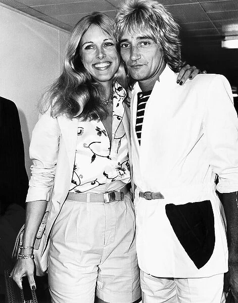 Rod Stewart Singer with girlfriend Alina at London Airport