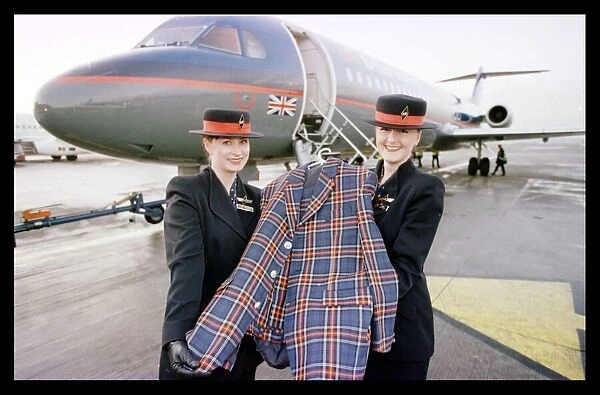 Rod Stewart tartan jacket December 1998 held by British Midland air stewardesses