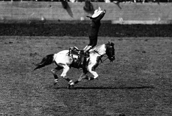 Rodeo cowgirl on a galloping bronco at Wembley. 14th June 1924