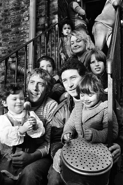 Roger Daltrey and Kenney Jones of the Who rock group visit Chiswick Family Rescue Home
