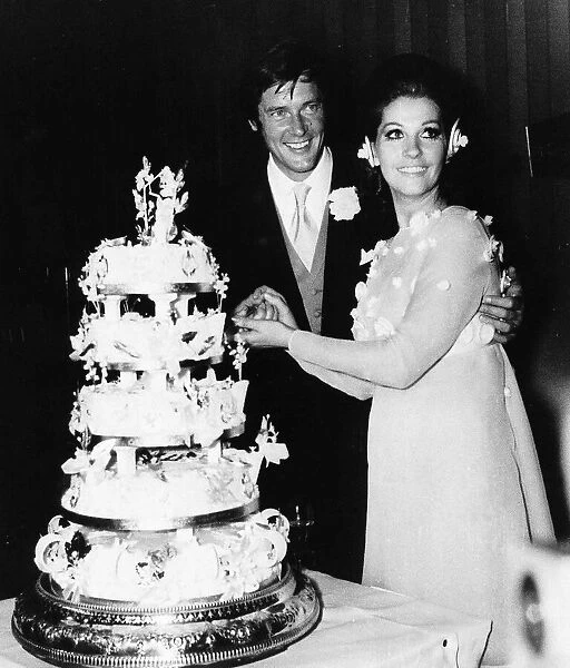 Roger Moore Actor with wife Luisa on their wedding day