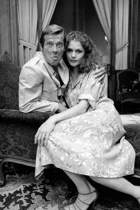 Framed Print : Roger Moore with actress Lois Chiles at a photocall and reception held in Paris to Framed Print : Roger Moore with actress Lois Chiles at a photocall and reception held in Paris to