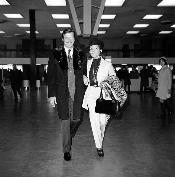Roger Moore and his wife Luisa left Heathrow Airport with Sir Lew Grade for the Monte