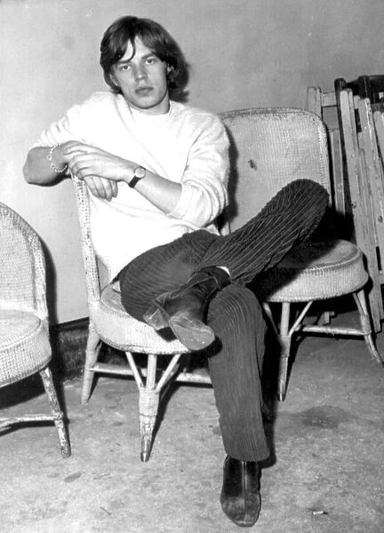 THE ROLLING STONES ARCHIVE Mick Jagger sitting backstage, 21 September 1964