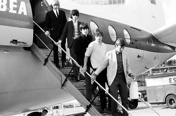 The Rolling Stones arrive at Manchester from London. l-r Brian Jones, Bill Wyman
