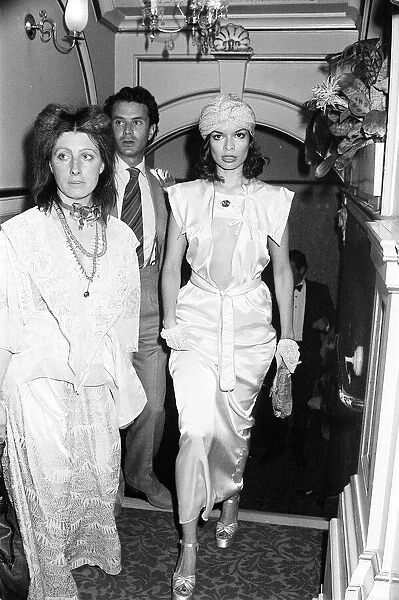Rolling Stones. Bianca Jagger wife of Mick Jagger in revealing open front dress in March