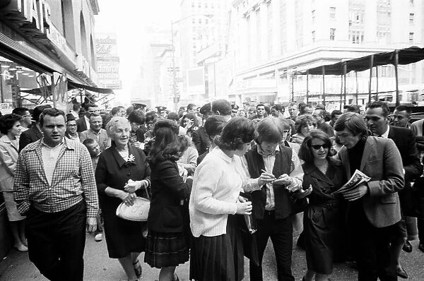 The Rolling Stones on Broadway. Brian Jones and Bill Wyman signing autographs