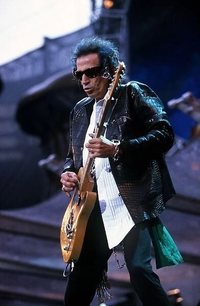 Rolling Stones in concert at Wembley Stadium 12th June 1999 Keith Richards playing