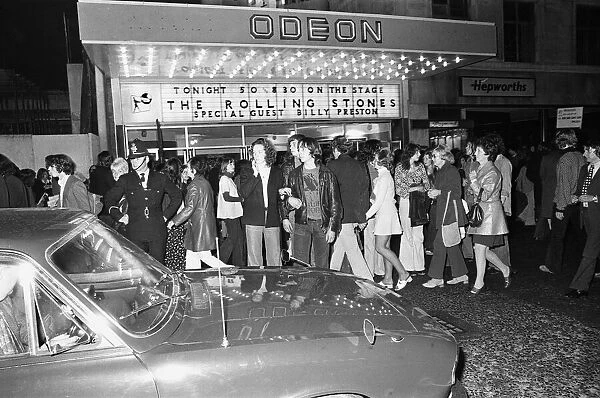 Rolling Stones fans queue outside the Odeon, New Street, Birmingham before the concert