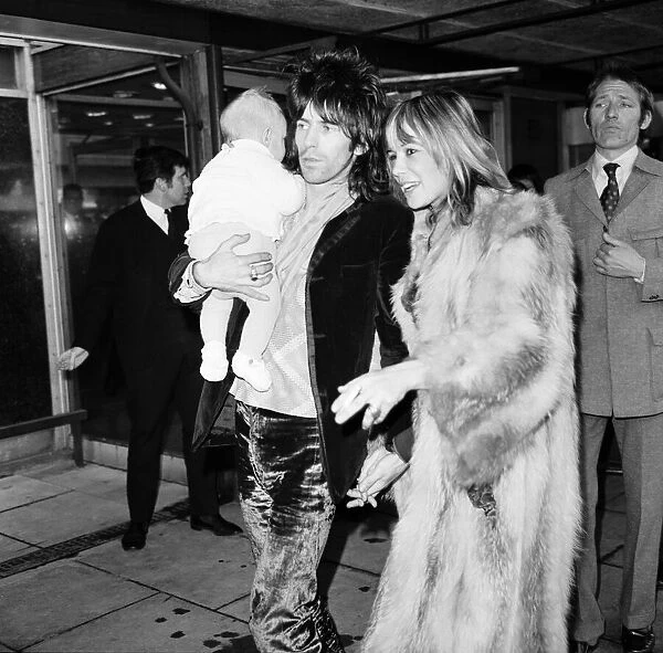 Rolling Stones guitarist Keith Richards at Heathrow airport met by Anita Pallenberg