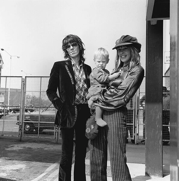 Rolling Stones. Keith Richards with Anita Pallenberg and their son Marlon at Heathrow