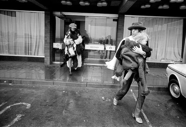 Rolling Stones: Keith Richards carrying his son Marlon and followed by Anita Pallenberg