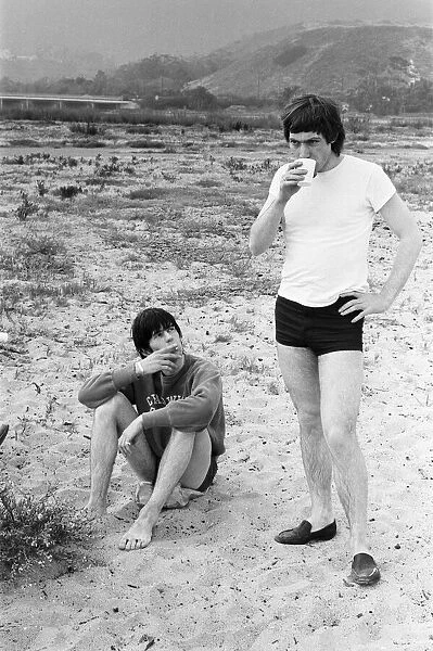 The Rolling Stones. Keith Richards and Charlie Watts seen here posing on Malibu beach
