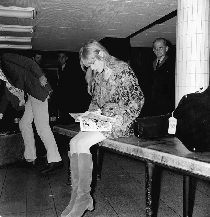 Framed Print : Rolling Stones lead singer Mick Jagger arrives at London Heathrow Airport with Marianne