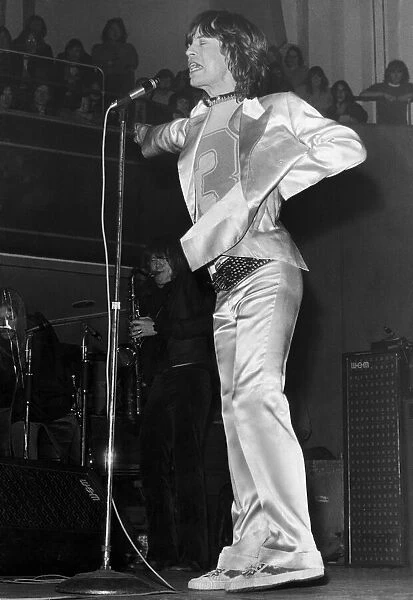 Rolling Stones lead singer Mick Jagger performing on stage in Manchester during their