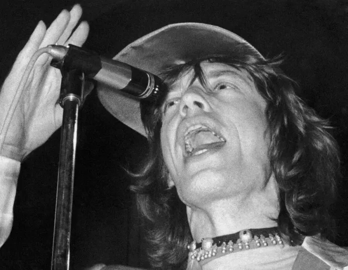 Framed Print : Rolling Stones lead singer Mick Jagger performing on stage in Manchester during their Framed Print : Rolling Stones lead singer Mick Jagger performing on stage in Manchester during their
