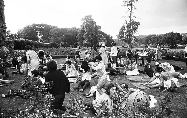 The Rolling Stones at Longleat, home of Lord Bath. Exhausted fans are attended to in