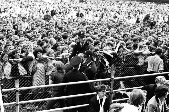 Framed Print : The Rolling Stones at Longleat, home of Lord Bath. Fainting girl fans are carried Framed Print : The Rolling Stones at Longleat, home of Lord Bath. Fainting girl fans are carried