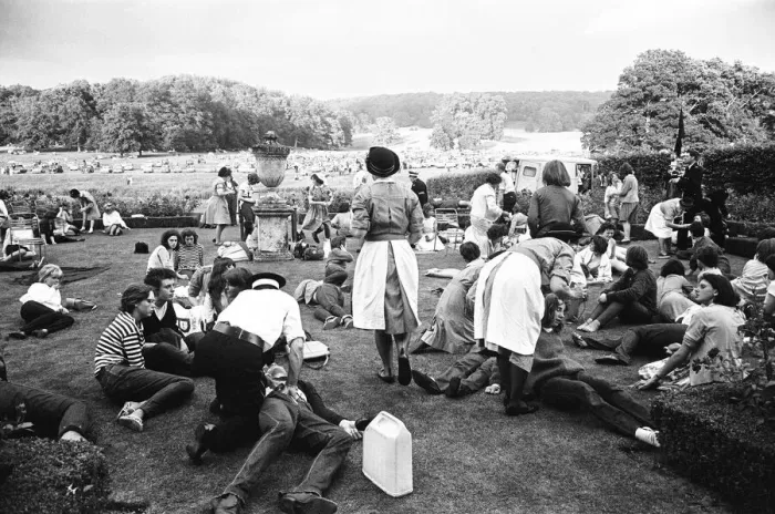 Framed Print : The Rolling Stones at Longleat, home of Lord Bath. Exhausted fans are attended to Framed Print : The Rolling Stones at Longleat, home of Lord Bath. Exhausted fans are attended to