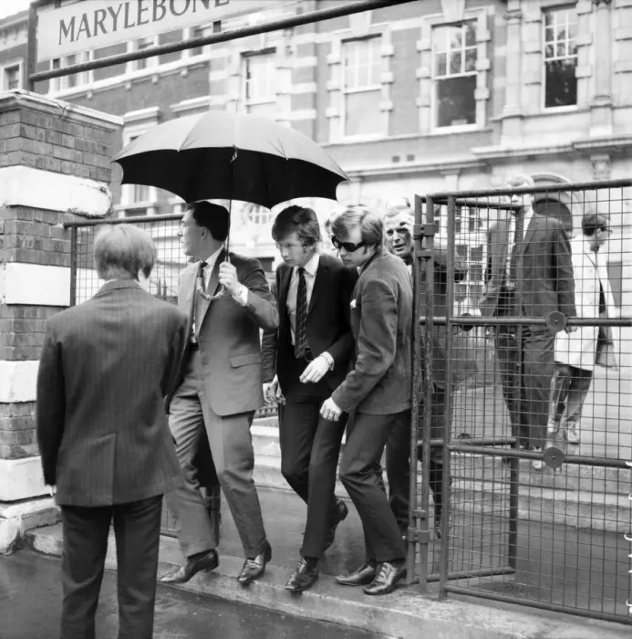 Framed Print : Rolling Stones: manager Andrew Loog Oldham and his chauffeur Reg Stiles (sunglasses Framed Print : Rolling Stones: manager Andrew Loog Oldham and his chauffeur Reg Stiles (sunglasses