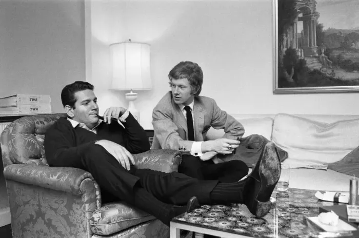 Framed Print : Rolling Stones manager Andrew Oldham in discussions with American business manager Allen Framed Print : Rolling Stones manager Andrew Oldham in discussions with American business manager Allen